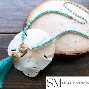 Silk tassel necklace inspired by the Aladdin folk tale. This bronze medallion